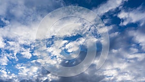 Fluffy cirrus clouds in the sky, background