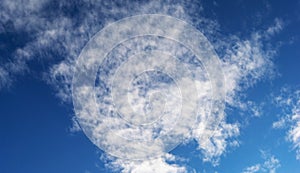 Fluffy cirrus clouds in the sky, background