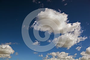 Fluffy clouds on beautirful blue sky