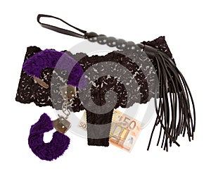 Fluffy purple handcuffs, a whip, money and panties, prostitution photo