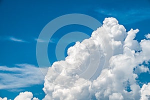 Fluffy white cloud on blue sky background