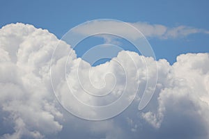 fluffy white cumulonimbus clouds and the blue sky in summer idea