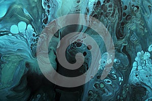 Fluid Art. Metallic Green and blue abstract waves with golden particles on black background. Marble effect background or