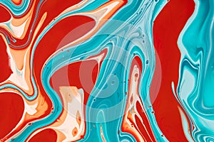 Fluid art texture with colorful inks blending. Abstract background with overflowing colors, currents and streams. Mixing