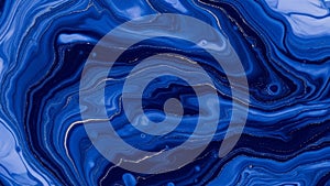 Fluid dynamic patterns in various shades of blue create a marbled effect