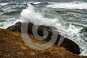 Wave crushing on a rocky shore
