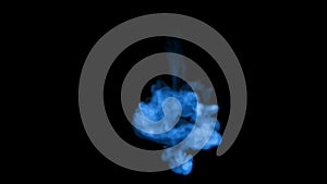 Fluorescent blue ink or smoke, isolated on black in slow motion. Blue paint spread in water. Use for ink background or