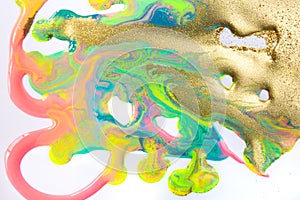 Fluorescent colorful liquid inks background with gold glitter particles. Marble imitation.