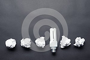 Fluorescent lamp and crumpled white paper balls