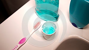 Fluoride cap and toothbrush in the bathroom