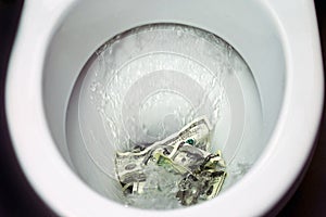 Flush money down the toilet