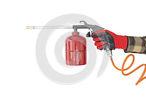 flushing gun in the hand of a worker