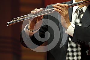 Flutist on concert photo