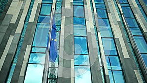 Fluttering flag of European Union with yellow stars