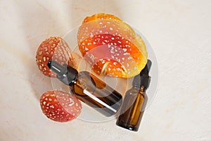 fly agaric red and glass amber dropper bottles