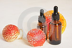 fly agaric red and glass amber dropper bottles