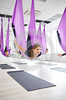 Fly antigravity yoga, training with hammocks