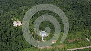 Fly drone from the old church. Drone from a bird`s eye view of an old-abandoned abandoned church. Abandoned old church on the