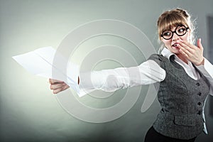 Fly fear. Woman holding airplane in hand.