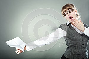 Fly fear. Woman holding airplane in hand.