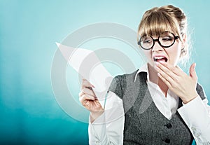 Fly fear. Woman holding airplane in hand.