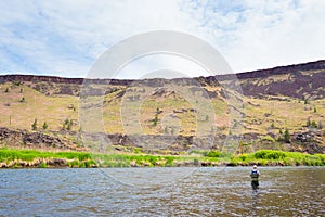 Fly Fisherman Casting on the Deschutes River