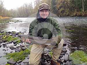 Fly Fisherman with Steelhead