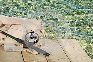 Fly fishing equipment on a dock