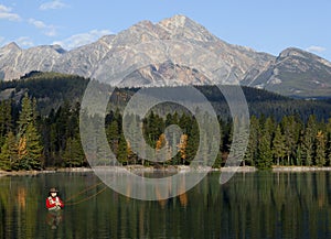 Fly Fishing In Rocky Mountains, Alberta, Canada