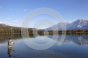 Fly Fishing In Rocky Mountains, Alberta, Canada