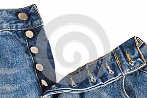 Fly of the jeans with button closure