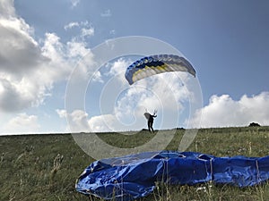 Fly men is a pilot of his body in air. Paragliding and speedflying. Air sport as a way of life.