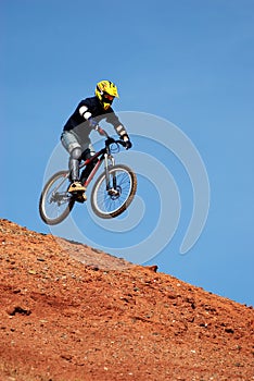 Fly mountain biker