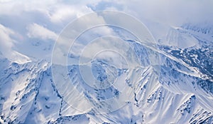 Fly Over Denali Mountain Snow Covered Peaks in Alaska