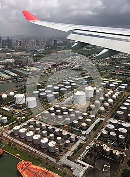 Fly over oil refinery tanks