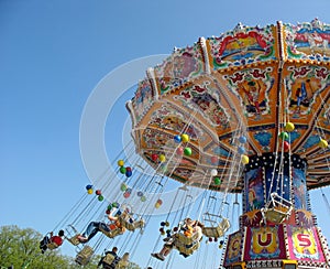 Fly in the sky - small colourful carousel