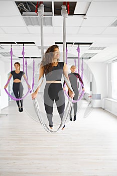 Fly yoga studio, hanging on hammocks, antigravity