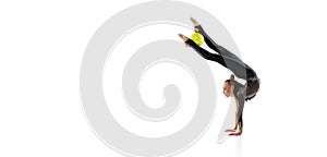 Flyer with of little sportive girl, rhythmic gymnastics artist isolated on white studio background. Concept of sport