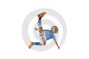 Flyer. Portrait of little male football soccer player, boy training with football ball isolated on white studio