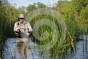 Flyfisher angling on the river