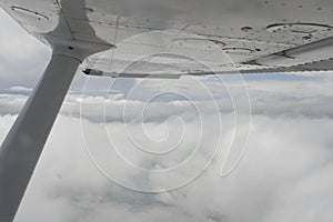 Flying above clouds in Cessna aircraft