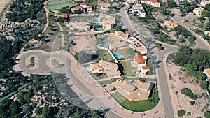 Flying Above Holiday Village on Shore Ocean