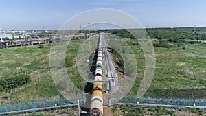 Flying above industrial railroad station