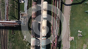 Flying above industrial railroad station