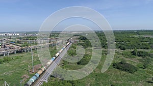 Flying above industrial railroad station