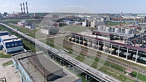 Flying above industrial railroad station