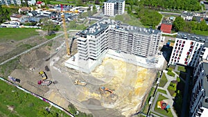 Flying above industrial railroad station with cargo trains and freight containers. Railroads and shipping container trains