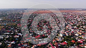 Flying above Pantelimon city, near Bucharest. Sunny autumn in Romania