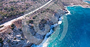 Flying above road by seashore