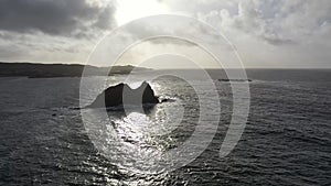 Flying above sea stacks at the beautiful coast at Maling Well, Inishowen - County Donegal, Ireland